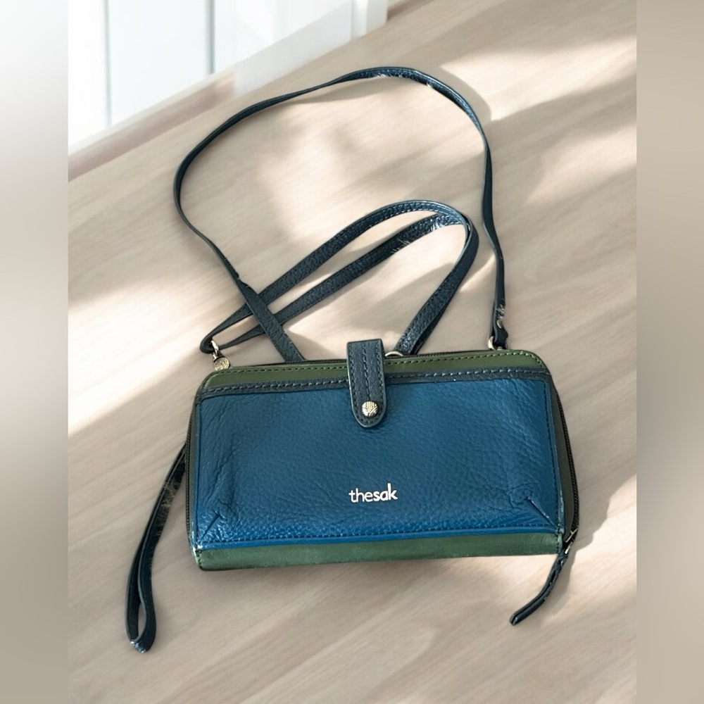 The Sak Wallets Wristlet with Crossbody Strap Blue/Green.